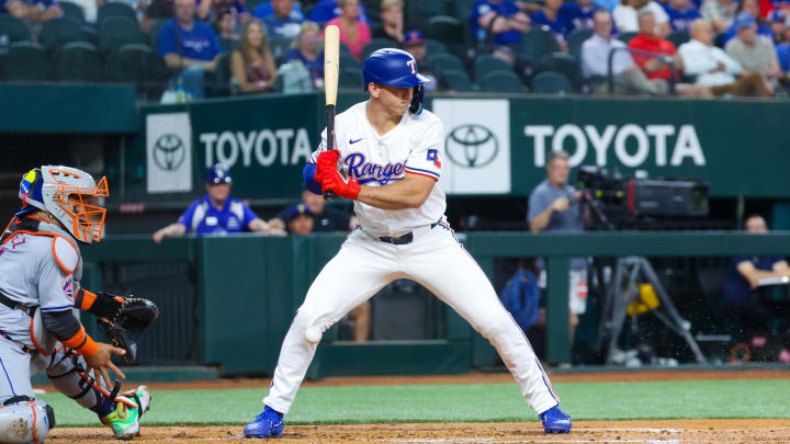 Jun 19, 2024; Arlington, Texas, USA; Texas Rangers center fielder Wyatt Langford (36) gets hit by a pitch during the first inning against the New York Mets at Globe Life Field. Mandatory Credit: Kevin Jairaj-USA TODAY Sports Jun 19, 2024; Arlington, Texas, USA; Texas Rangers center fielder Wyatt Langford (36) gets hit by a pitch during the first inning against the New York Mets at Globe Life Field. Mandatory Credit: Kevin Jairaj-USA TODAY Sports