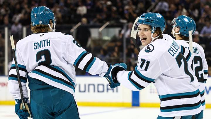 Oct 23, 2025; New York, New York, USA;  San Jose Sharks center Macklin Celebrini (71) celebrates with center Will Smith (2) after scoring a goal in the first period against the New York Rangers at Madison Square Garden. Mandatory Credit: Wendell Cruz-Imagn Images