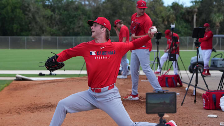 Feb 12, 2025; Jupiter, FL, USA;  St. Louis Cardinals pitcher Quinn Mathews throws during Spring Training. Mandatory Credit: Jim Rassol-Imagn Images