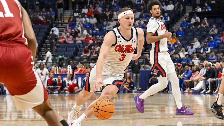 Mar 13, 2025; Nashville, TN, USA;  Mississippi Rebels guard Sean Pedulla (3) drives to the basket against the Arkansas Razorbacks during the first half at Bridgestone Arena. Mandatory Credit: Steve Roberts-Imagn Images