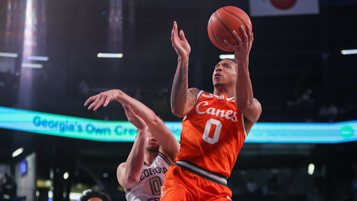 Mar 4, 2025; Atlanta, Georgia, USA; Miami Hurricanes guard Matthew Cleveland (0) shoots against the Georgia Tech Yellow Jackets in the first half at McCamish Pavilion. Mandatory Credit: Brett Davis-Imagn Images