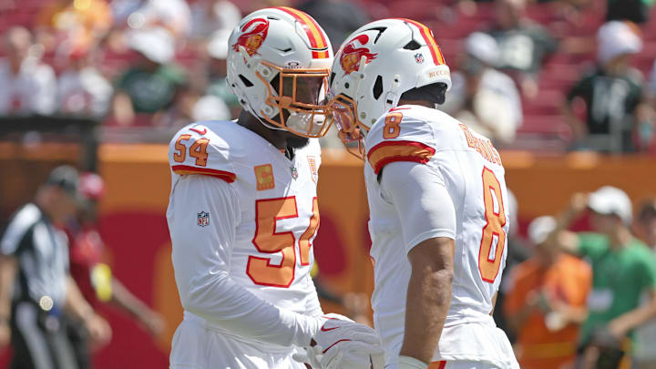 Tampa Bay Buccaneers linebackers Lavonte David (54) and Sirvocea Dennis (8) against the New York Jets prior to the game at Raymond James Stadium. Tampa Bay Buccaneers linebackers Lavonte David (54) and Sirvocea Dennis (8) against the New York Jets prior to the game at Raymond James Stadium.