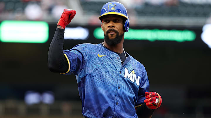 Sep 20, 2025; Minneapolis, Minnesota, USA; Minnesota Twins designated hitter Byron Buxton (25) celebrates a single against the Cleveland Guardians during the first inning of game two of a double header at Target Field. Mandatory Credit: Matt Krohn-Imagn Images