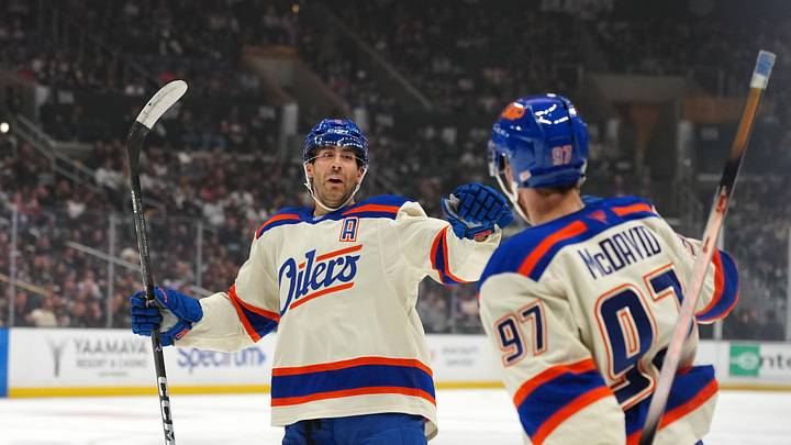 Oct 13, 2026; Los Angeles, California, USA; Edmonton Oilers defenseman Evan Bouchard (2) and center Connor McDavid (97) celebrate after a goal against the LA Kings in the first period at Crypto.com Arena. Mandatory Credit: Kirby Lee-Imagn Images