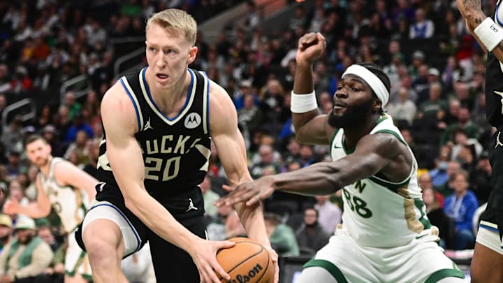 Jan 11, 2024; Milwaukee, Wisconsin, USA; Milwaukee Bucks guard AJ Green (20) looks to pass against