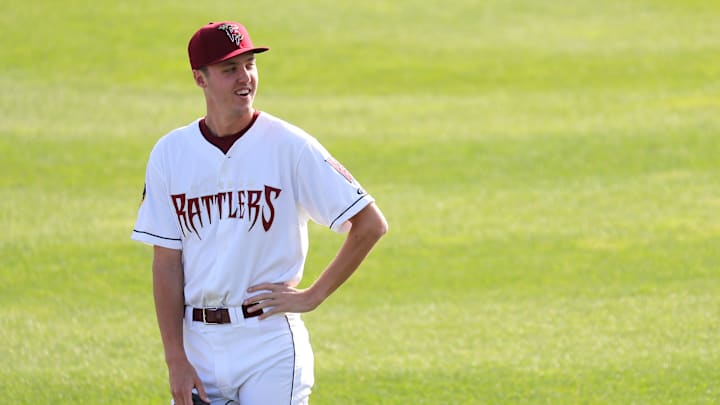 Wisconsin Timber Rattlers' Jacob Misiorowski (25) warms up in the outfield before pitching against