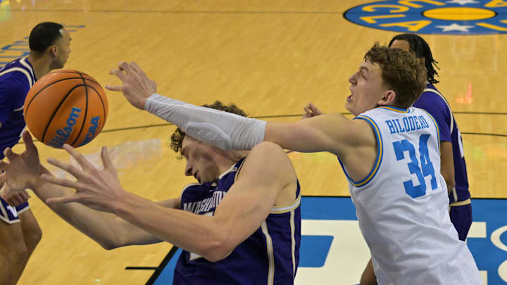 Feb 7, 2026; Los Angeles, California, USA;  Washington Huskies forward Hannes Steinbach (6) is fouled by UCLA Bruins forward Tyler Bilodeau (34) in the first half at Pauley Pavilion presented by Wescom Financial. Mandatory Credit: Jayne Kamin-Oncea-Imagn Images