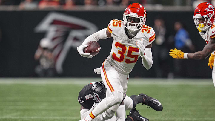 Sep 22, 2024; Atlanta, Georgia, USA; Kansas City Chiefs cornerback Jaylen Watson (35) runs after taking a lateral after an interception against the Atlanta Falcons during the second half at Mercedes-Benz Stadium. Mandatory Credit: Dale Zanine-Imagn Images