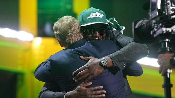 Apr 23, 2026; Pittsburgh, PA, USA; Texas Tech Red Raiders linebacker David Bailey embraces NFL commissioner Roger Goodell after he is selected by the New York Jets as the number two pick during the 2026 NFL Draft at Acrisure Stadium. Mandatory Credit: Kirby Lee-Imagn Images