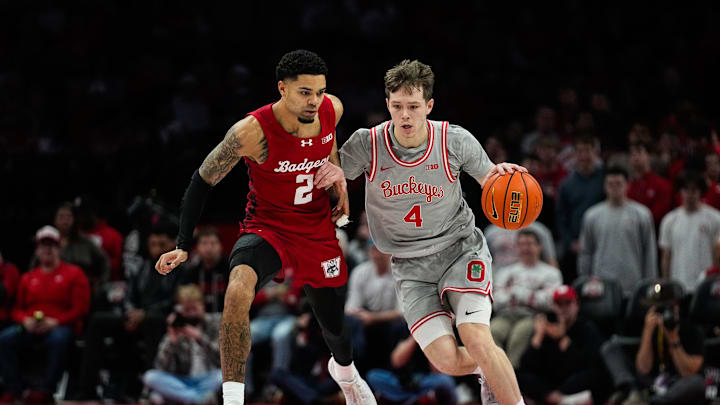 Ohio State Buckeyes guard Gabe Cupps (4) dribbles the ball against Wisconsin Badgers guard Nick Boyd (2) in the second half of the NCAA game at Value City Arena on Tuesday, Feb. 17, 2026 in Columbus, Ohio.