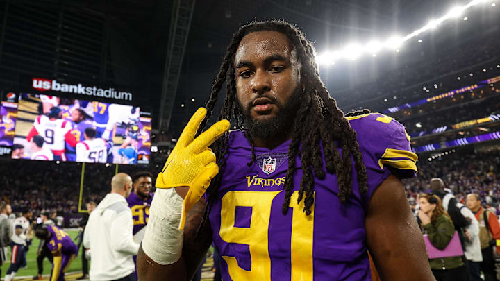 Nov 24, 2022; Minneapolis, Minnesota, USA; Minnesota Vikings linebacker Patrick Jones II (91) celebrates after defeating the New England Patriots after the game at U.S. Bank Stadium. Mandatory Credit: Matt Krohn-Imagn Images