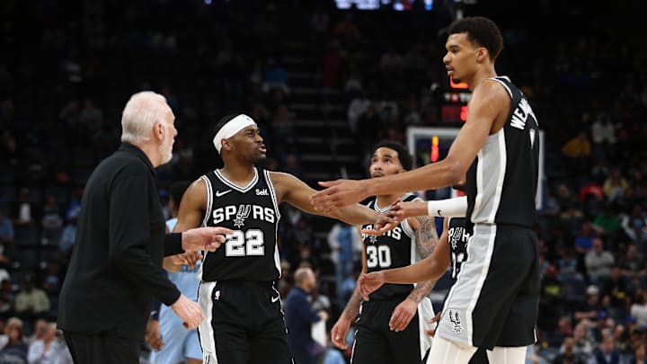Apr 9, 2024; Memphis, Tennessee, USA; San Antonio Spurs guard Malaki Branham (22) reacts with center Victor Wembanyama (1) after a basket during the second half against the Memphis Grizzlies at FedExForum. Mandatory Credit: Petre Thomas-Imagn Images