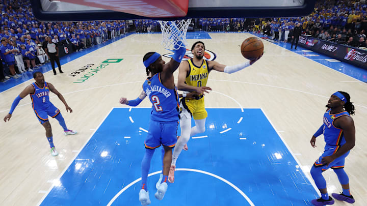 Jun 22, 2025; Oklahoma City, Oklahoma, USA; Indiana Pacers guard Tyrese Haliburton (0) drives to the basket against Oklahoma City Thunder guard Shai Gilgeous-Alexander (2) during game seven of the 2025 NBA Finals at Paycom Center. Mandatory Credit: Matthew Stockman-Pool Photo via Imagn Images Jun 22, 2025; Oklahoma City, Oklahoma, USA; Indiana Pacers guard Tyrese Haliburton (0) drives to the basket against Oklahoma City Thunder guard Shai Gilgeous-Alexander (2) during game seven of the 2025 NBA Finals at Paycom Center. Mandatory Credit: Matthew Stockman-Pool Photo via Imagn Images