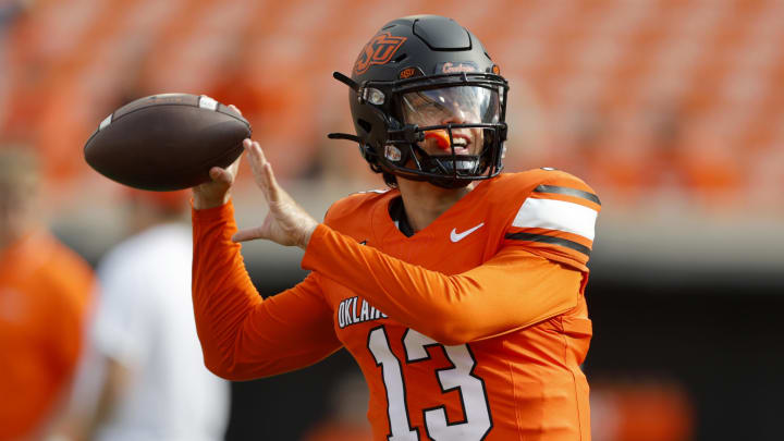 Sep 16, 2023; Stillwater, Oklahoma, USA; Oklahoma State Cowboys quarterback Garret Rangel (13) warms up before an NCAA football game between Oklahoma State and South Alabama at Boone Pickens Stadium. Mandatory Credit: Bryan Terry-USA TODAY Sports