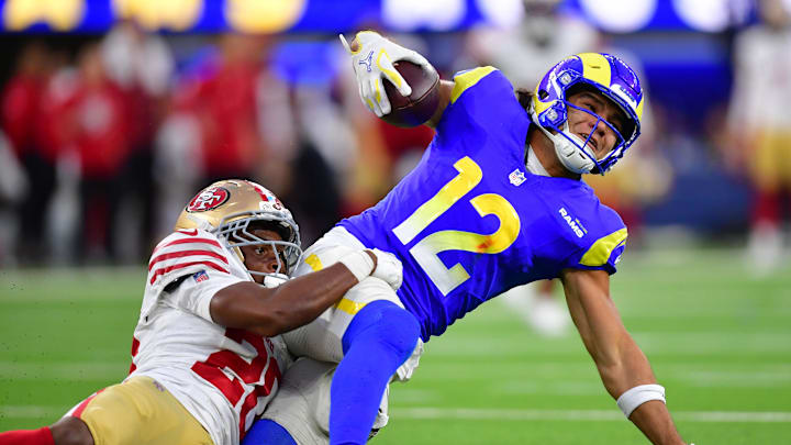 Oct 2, 2025; Inglewood, California, USA; Los Angeles Rams wide receiver Puka Nacua (12) makes a catch against San Francisco 49ers cornerback Upton Stout (20) during the first half at SoFi Stadium. Mandatory Credit: Gary A. Vasquez-Imagn Images Oct 2, 2025; Inglewood, California, USA; Los Angeles Rams wide receiver Puka Nacua (12) makes a catch against San Francisco 49ers cornerback Upton Stout (20) during the first half at SoFi Stadium. Mandatory Credit: Gary A. Vasquez-Imagn Images