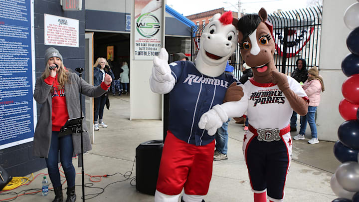 Alyssa Crosby, a contestant on The Voice, entertains fans before a Binghamton Rumble Ponies game