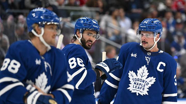 Sep 29, 2026; Toronto, Ontario, CAN;  Toronto Maple Leafs forward Kirill Marchenko (86) speaks with forward Auston Matthews (34) during a time-out against the Montreal Canadiens in the first period at Scotiabank Arena.  Mandatory Credit: Dan Hamilton-Imagn Images