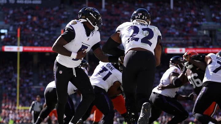 Oct 18, 2026; Cleveland, Ohio, USA;  Baltimore Ravens quarterback Tyler Huntley (5) hands the ball off to running back Derrick Henry (22) in the second quarter against the Cleveland Browns at Huntington Bank Field.  Mandatory Credit: Scott Galvin-Imagn Images