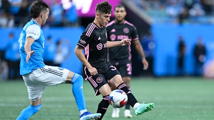 Inter Miami's Noah Allen tries to maneuver around a Charlotte FC player during the 2023 MLS regular season.