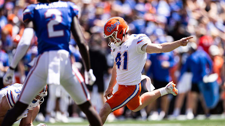 Florida Gators kicker Hunter Smith (41) kicks a field goal during the first half at the Orange and Blue spring football game at Steve Spurrier Field at Ben Hill Griffin Stadium in Gainesville, FL on Saturday, April 13, 2024. [Matt Pendleton/Gainesville Sun]
