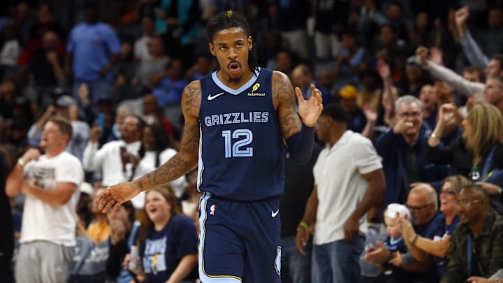 Oct 31, 2024; Memphis, Tennessee, USA; Memphis Grizzlies guard Ja Morant (12) reacts during the first half against the Milwaukee Bucks at FedExForum. Mandatory Credit: Petre Thomas-Imagn Images Oct 31, 2024; Memphis, Tennessee, USA; Memphis Grizzlies guard Ja Morant (12) reacts during the first half against the Milwaukee Bucks at FedExForum. Mandatory Credit: Petre Thomas-Imagn Images