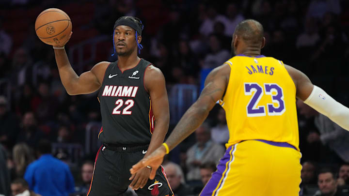 Dec 4, 2024; Miami, Florida, USA; Miami Heat forward Jimmy Butler (22) looks to pass against Los Angeles Lakers forward LeBron James (23) in the first half at Kaseya Center. Mandatory Credit: Jim Rassol-Imagn Images Dec 4, 2024; Miami, Florida, USA; Miami Heat forward Jimmy Butler (22) looks to pass against Los Angeles Lakers forward LeBron James (23) in the first half at Kaseya Center. Mandatory Credit: Jim Rassol-Imagn Images