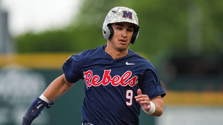 Ole Miss outfielder Hayden Federico (9) runs to third base during a NCAA baseball game between Tennessee and Ole Miss at Lindsey Nelson Stadium on April 18, 2026.