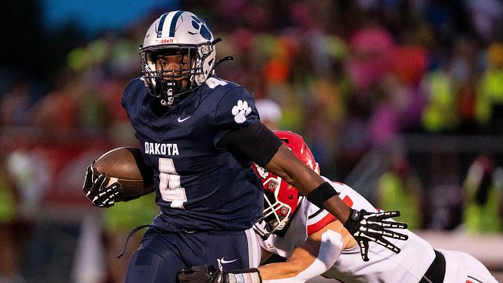 Dakota senior running back Jeremiah Aaron (4) runs with the ball in the second quarter during a high school football game at Dakota High School in Macomb on Friday, Sept. 18, 2026. Dakota senior running back Jeremiah Aaron (4) runs with the ball in the second quarter during a high school football game at Dakota High School in Macomb on Friday, Sept. 18, 2026.