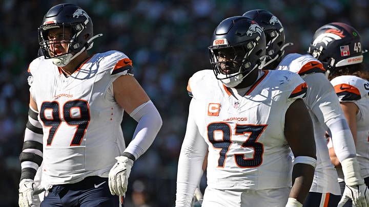 Denver Broncos defensive end Zach Allen (99) and defensive tackle D.J. Jones 