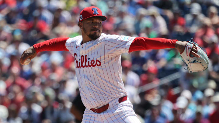 Mar 19, 2025; Clearwater, Florida, USA;  Philadelphia Phillies pitcher Taijuan Walker (99) throws a pitch during the first inning against the New York Yankees  at BayCare Ballpark.