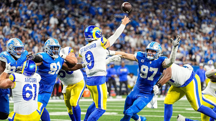 Detroit Lions defensive end Aidan Hutchinson (97) pressures Los Angeles Rams quarterback Matthew Stafford (9) during the second half at Ford Field in Detroit on Sunday, September 8, 2024. Detroit Lions defensive end Aidan Hutchinson (97) pressures Los Angeles Rams quarterback Matthew Stafford (9) during the second half at Ford Field in Detroit on Sunday, September 8, 2024.