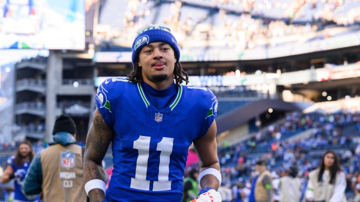 Oct 29, 2023; Seattle, Washington, USA; Seattle Seahawks wide receiver Jaxon Smith-Njigba (11) walks off the field after the Seattle Seahawks defeated the Cleveland Browns at Lumen Field. Mandatory Credit: Steven Bisig-USA TODAY Sports