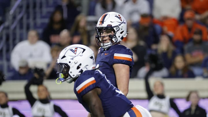 Nov 8, 2025; Charlottesville, Virginia, USA; Virginia Cavaliers quarterback Chandler Morris (4) looks on from the field against the Wake Forest Demon Deacons during the first half at Scott Stadium. Mandatory Credit: Amber Searls-Imagn Images
