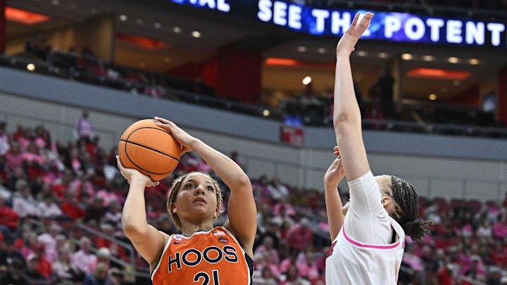 Feb 22, 2026; Louisville, Kentucky, USA; Virginia Cavaliers guard Kymora Johnson (21) shoots against Louisville Cardinals guard Imari Berry (2) during the second half at KFC Yum! Center. Mandatory Credit: Jamie Rhodes-Imagn Images Feb 22, 2026; Louisville, Kentucky, USA; Virginia Cavaliers guard Kymora Johnson (21) shoots against Louisville Cardinals guard Imari Berry (2) during the second half at KFC Yum! Center. Mandatory Credit: Jamie Rhodes-Imagn Images