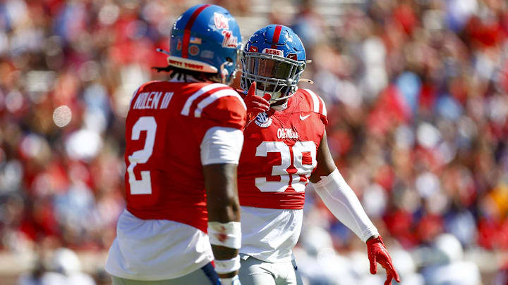 Sep 7, 2024; Oxford, Mississippi, USA; Mississippi Rebels defensive linemen JJ Pegues (38) reacts with Walter Nolen (2) after a defensive stop during the first half against the Middle Tennessee Blue Raiders at Vaught-Hemingway Stadium. Mandatory Credit: Petre Thomas-Imagn Images