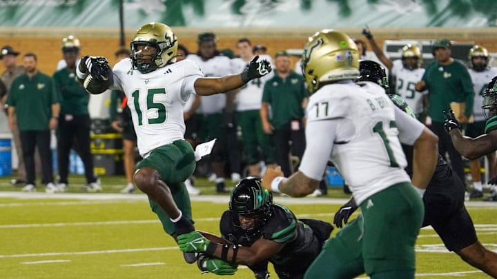 Running back Alvon Isaac (15) helped contribute to USF's offensive eruption at North Texas