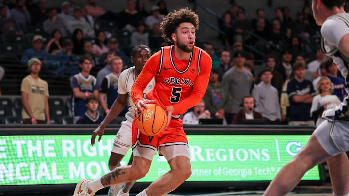 Feb 18, 2026; Atlanta, Georgia, USA; Virginia Cavaliers guard Sam Lewis (5) drives to the basket against the Georgia Tech Yellow Jackets in the first half at McCamish Pavilion. Mandatory Credit: Brett Davis-Imagn Images Feb 18, 2026; Atlanta, Georgia, USA; Virginia Cavaliers guard Sam Lewis (5) drives to the basket against the Georgia Tech Yellow Jackets in the first half at McCamish Pavilion. Mandatory Credit: Brett Davis-Imagn Images