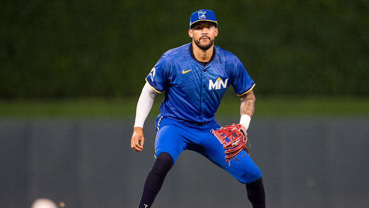 Minnesota Twins shortstop Carlos Correa watches a sharply hit ball go just foul in the  at Target Field in Minneapolis on Sept. 27, 2024. 