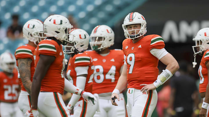 Nov 18, 2023; Miami Gardens, Florida, USA; Miami Hurricanes quarterback Tyler Van Dyke (9) looks on prior to the game against the Louisville Cardinals at Hard Rock Stadium. Mandatory Credit: Sam Navarro-USA TODAY Sports