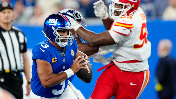 New York Giants quarterback Russell Wilson (3) runs from the Kansas City defense as he looks for an open teammate, Sunday, September 21, 2025.