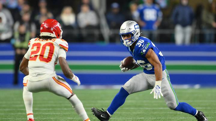 Oct 25, 2026; Seattle, Washington, USA;  Seattle Seahawks running back George Holani (36) carries the ball defended by Kansas City Chiefs defensive back Nohl Williams (20) during the third quarter at Lumen Field.  Mandatory Credit: Steven Bisig-Imagn Images