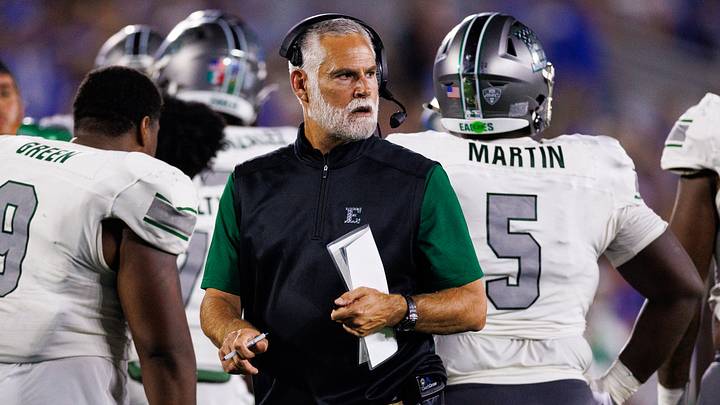 Sep 13, 2025; Lexington, Kentucky, USA; Eastern Michigan Eagles head coach Chris Creighton looks on during the second quarter against the Kentucky Wildcats at Kroger Field. Mandatory Credit: Jordan Prather-Imagn Images