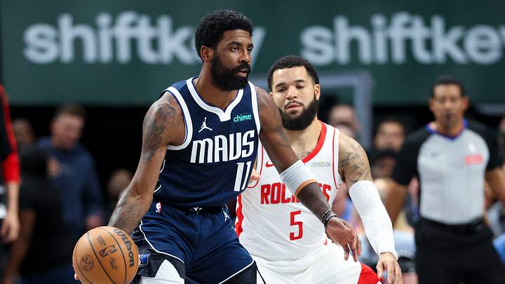 Oct 31, 2024; Dallas, Texas, USA;  Dallas Mavericks guard Kyrie Irving (11)  controls the ball as Houston Rockets guard Fred VanVleet (5) defends during the first quarter at American Airlines Center. Mandatory Credit: Kevin Jairaj-Imagn Images