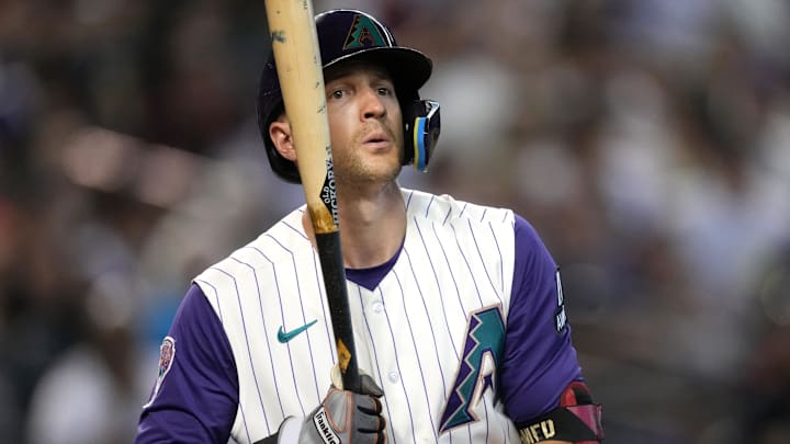 Aug 12, 2023; Phoenix, AZ, USA; Arizona Diamondbacks' Nick Ahmed (13) reacts to a called srike at