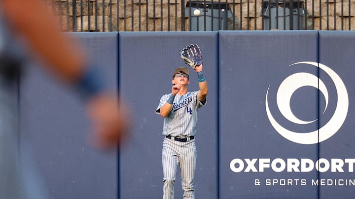 May 31, 2025; Oxford, MS, USA; Georgia Tech Yellowjackets pitcher/infielder Alex Hernandez (4) catches a fly ball during the first inning against the Murray State Racers. Mandatory Credit: Petre Thomas-Imagn Images