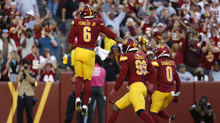 Oct 20, 2024; Landover, Maryland, USA; Washington Commanders linebacker Dante Fowler Jr. (6) celebrates after making a tackle on a fourth down conversion attempt against the Carolina Panthers during the second quarter at Northwest Stadium. Mandatory Credit: Geoff Burke-Imagn Images Oct 20, 2024; Landover, Maryland, USA; Washington Commanders linebacker Dante Fowler Jr. (6) celebrates after making a tackle on a fourth down conversion attempt against the Carolina Panthers during the second quarter at Northwest Stadium. Mandatory Credit: Geoff Burke-Imagn Images