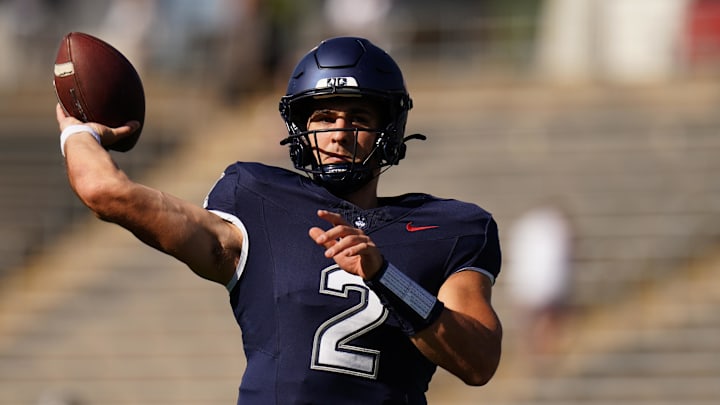 Oct 4, 2025; East Hartford, Connecticut, USA;  UConn Huskies quarterback Joe Fagnano (2) warms up before the start of the game against the FIU Panthers at Pratt & Whitney Stadium at Rentschler Field. Mandatory Credit: David Butler II-Imagn Images