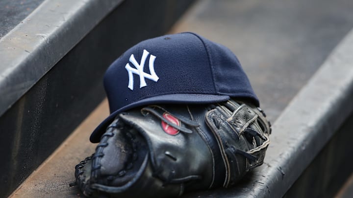 Jul 24, 2013; Arlington, TX, USA; New York Yankees hat and glove sit on the dugout steps during the game against the Texas Rangers at Rangers Ballpark in Arlington. Texas won 3-1. Mandatory Credit: Kevin Jairaj-Imagn Images Jul 24, 2013; Arlington, TX, USA; New York Yankees hat and glove sit on the dugout steps during the game against the Texas Rangers at Rangers Ballpark in Arlington. Texas won 3-1. Mandatory Credit: Kevin Jairaj-Imagn Images