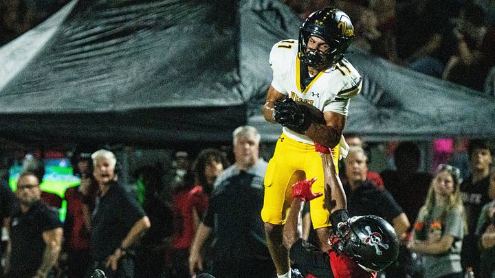 Bishop Verot's Ayden Gonzalez (11) makes a big catch against Port Charlotte earlier this season. Last week, the senior caught four passes for 90 yards and one touchdown and returned two punts for scores to lead the Vikings past Island Coast, 64-0. Bishop Verot's Ayden Gonzalez (11) makes a big catch against Port Charlotte earlier this season. Last week, the senior caught four passes for 90 yards and one touchdown and returned two punts for scores to lead the Vikings past Island Coast, 64-0.