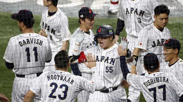 Mar 21, 2023; Miami, Florida, USA; Japan third baseman Munetaka Murakami (55) celebrates home run against the USA in the second inning at LoanDepot Park. Mandatory Credit: Rhona Wise-Imagn Images